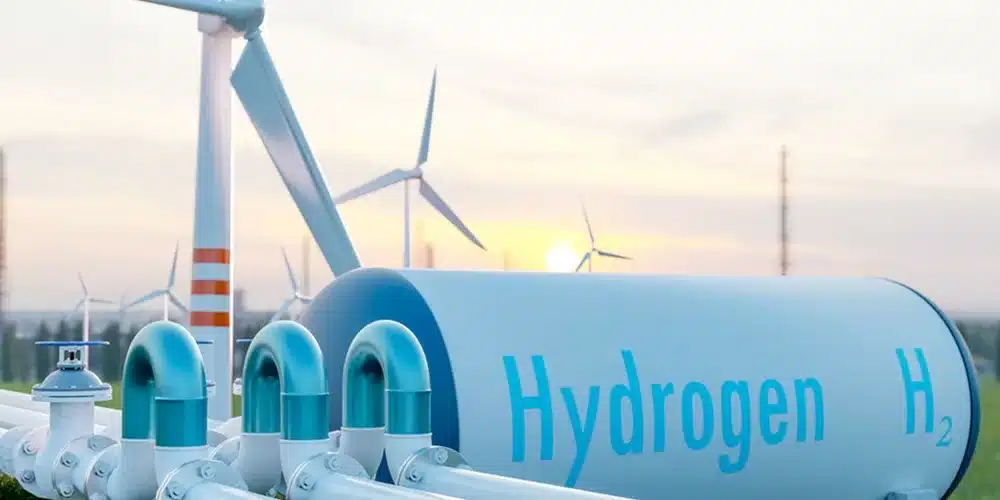 hydrogen-pipeline-hydrogen-fuel-tank-with-wind-turbines-farm-green-power-environmental-protection-concept.webp